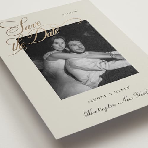 This is a champagne foil stamped save the date cards with foil pressed by Benita Crandall called flourishing script printing on recycled smooth signature in standard