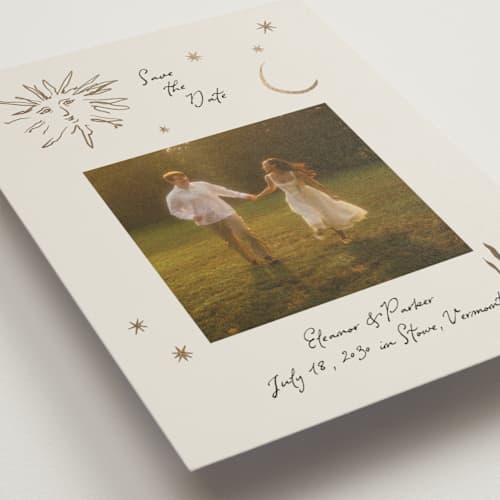 This is a champagne foil stamped save the date cards with foil pressed by Heather Schertzer called soleil printing on recycled smooth signature in standard