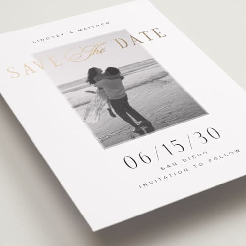 This is a noir foil stamped save the date cards with foil pressed by Jennifer Postorino called layered printing on recycled smooth signature in standard