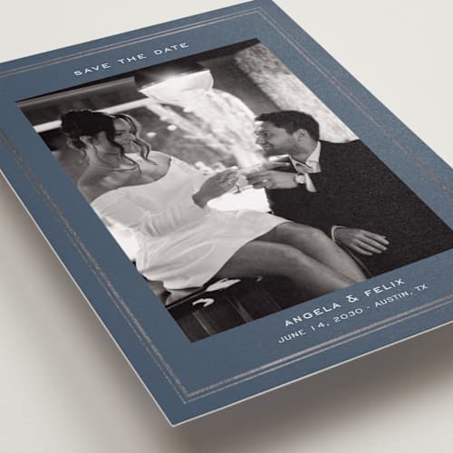 This is a steel foil stamped save the date cards with foil pressed by Nicole Walsh called double frame printing on recycled smooth signature in standard