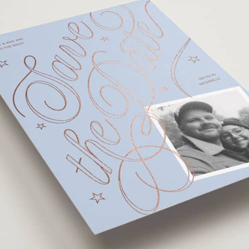 This is a milky way foil stamped save the date cards with foil pressed by Inkblot Design called swirl printing on recycled smooth signature in standard