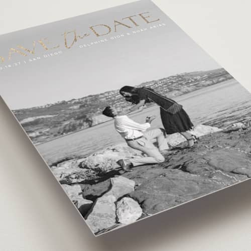 This is a moonstone foil stamped save the date cards with foil pressed by Olivia Raufman called breathtaking printing on recycled smooth signature in standard