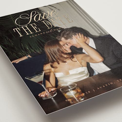 This is a camel foil stamped save the date cards with foil pressed by Maria Alou called his & hers printing on recycled smooth signature in standard