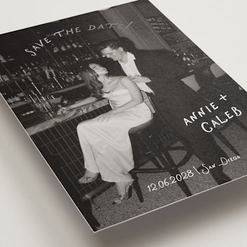 This is a ivory foil stamped save the date cards with foil pressed by Stephanie Heinrich Godbout called lovers printing on recycled smooth signature in standard