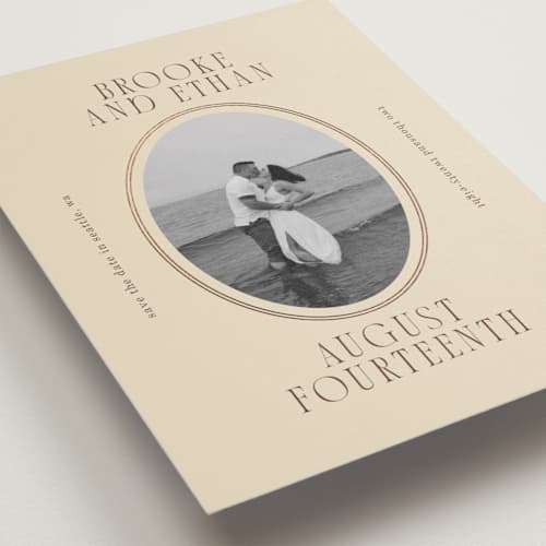 This is a buttercream foil stamped save the date cards with foil pressed by Angela Garrick called ethan printing on recycled smooth signature in standard