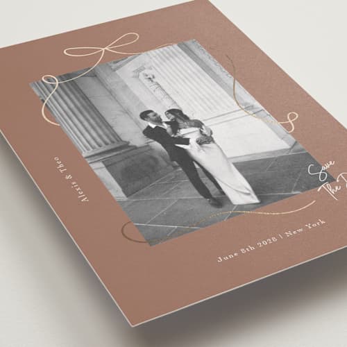 This is a coffee foil stamped save the date cards with foil pressed by Elly called gentle bow printing on recycled smooth signature in standard