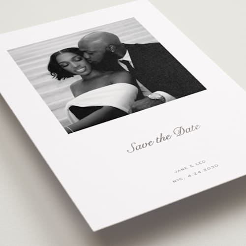 This is a snow foil stamped save the date cards with foil pressed by Megan Davis called curate printing on recycled smooth signature in standard