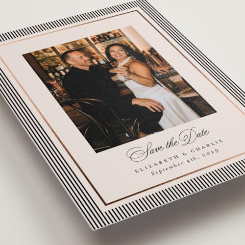 This is a linen foil stamped save the date cards with foil pressed by Kelly Schmidt called striped elegance printing on recycled smooth signature in standard