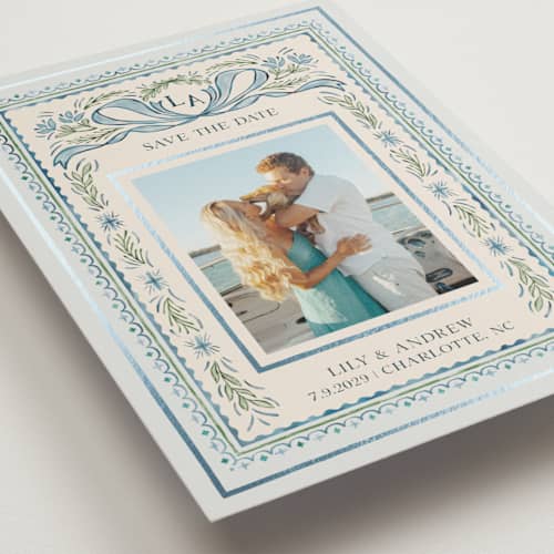 This is a blue jay foil stamped save the date cards with foil pressed by Paper Sun Studio called gift printing on recycled smooth signature in standard