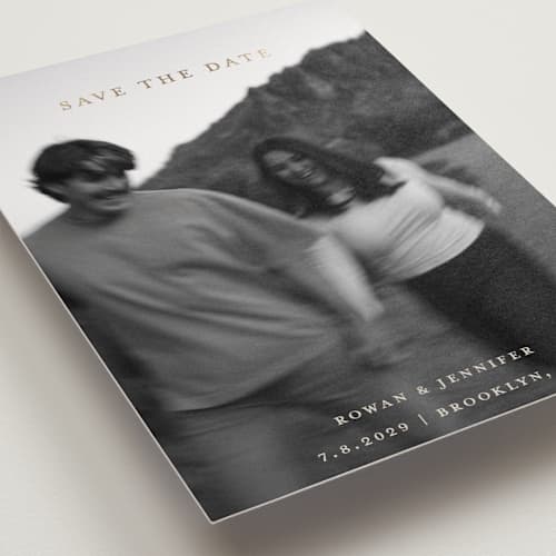 This is a buttercream foil stamped save the date cards with foil pressed by Carolyn Hunt called golden printing on recycled smooth signature in standard