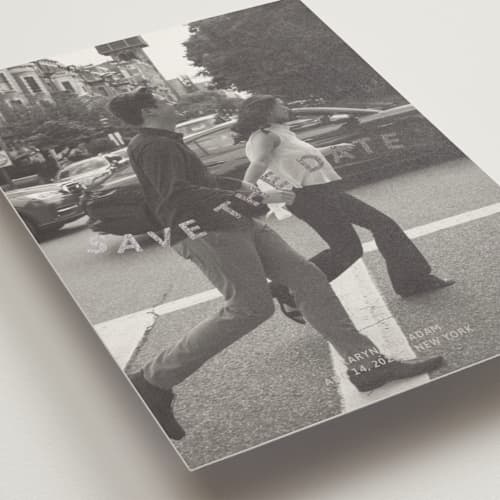 This is a greige foil stamped save the date cards with foil pressed by Inkblot Design called wavy printing on recycled smooth signature in standard