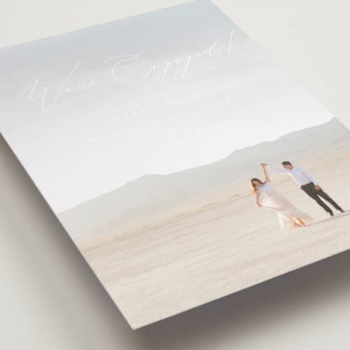 This is a snow save the date with standard by Snow and Ivy called enchantment printing on recycled smooth signature in standard