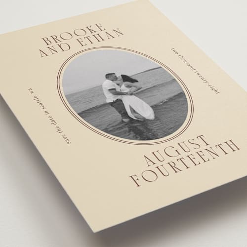 This is a buttercream save the date with standard by Angela Garrick called ethan printing on recycled smooth signature in standard