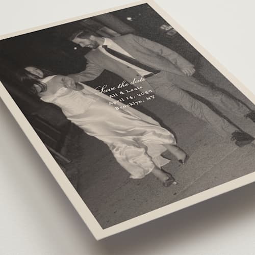 This is a cream save the date with standard by Ellen Schlegelmilch called louie printing on recycled smooth signature in standard