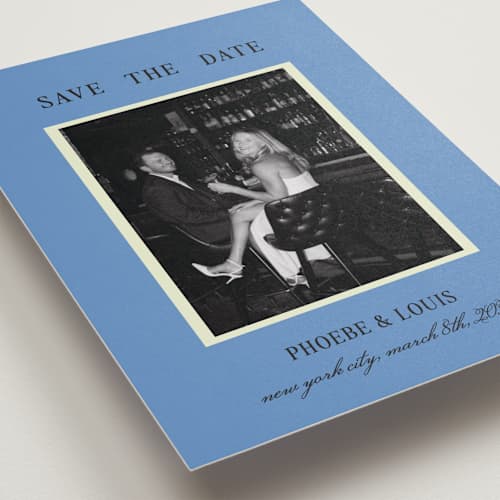 This is a cornflower save the date with standard by Ani Somi called blue save the date printing on recycled smooth signature in standard