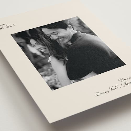 This is a graphite save the date with standard by Megan Davis called gimlet printing on recycled smooth signature in standard
