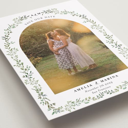 This is a mojito save the date with standard by Susan Moyal called monogramed arch printing on recycled smooth signature in standard