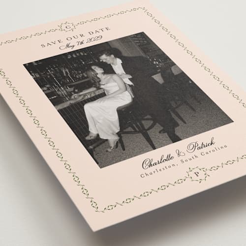 This is a blush save the date with standard by Susan Moyal called monogramed printing on recycled smooth signature in standard