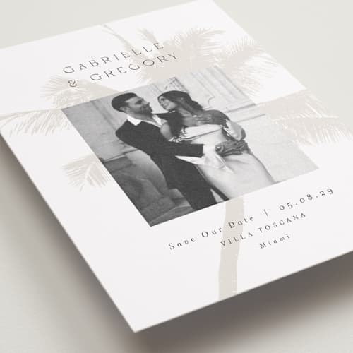 This is a ecru save the date with standard by AK Graphics called palm printing on recycled smooth signature in standard