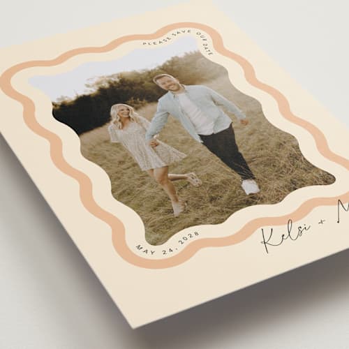 This is a seashell save the date with standard by Robert and Stella called wavy printing on recycled smooth signature in standard