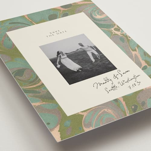 This is a sage save the date with standard by Leia Matt called marbled editorial printing on recycled smooth signature in standard