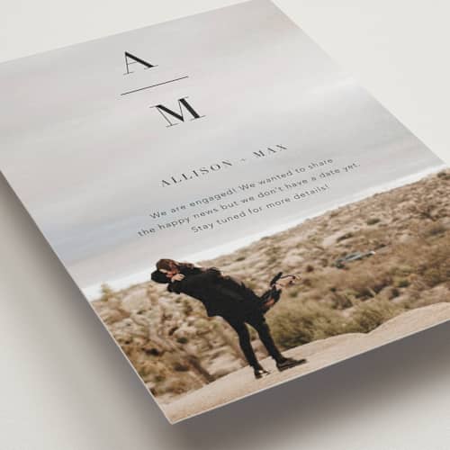 This is a night save the date with standard by Ashley Lopez called stacked initials printing on recycled smooth signature in standard