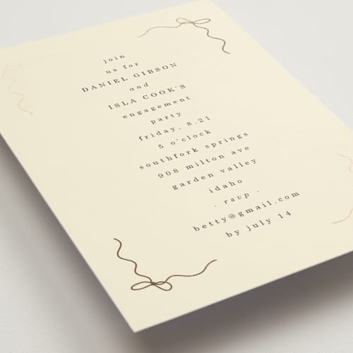 This is a cream engagement party invitations with foil pressed by Baumbirdy called bows printing on signature in standard
