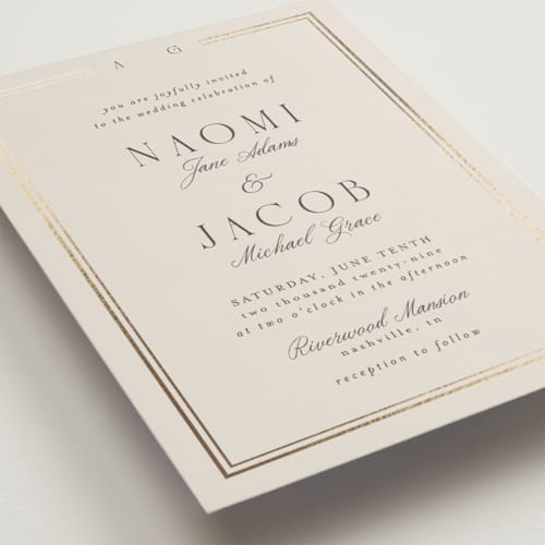 This is a champagne foil stamped wedding invitations with foil pressed by Nicole Walsh called grace printing on signature in standard