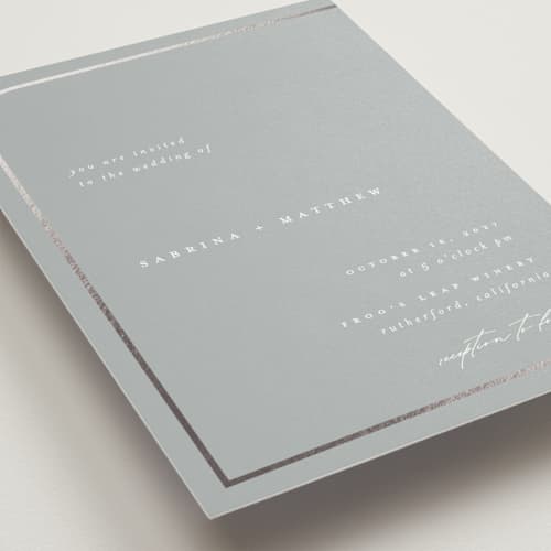 This is a dusty blue foil stamped wedding invitations with foil pressed by Carolyn Nicks called tuxedo printing on signature in standard