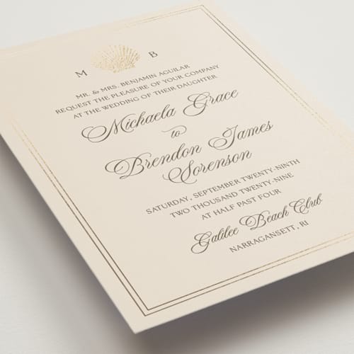 This is a champagne foil stamped wedding invitations with foil pressed by Griffinbell Paper Co. called seaside printing on signature in standard