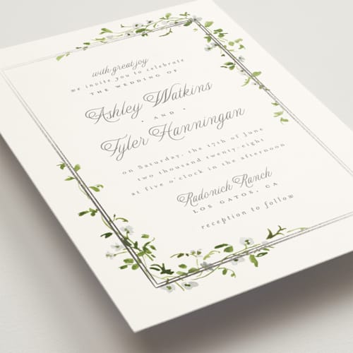This is a dew foil stamped wedding invitations with foil pressed by Everett Paper Goods called flowering vine printing on signature in standard