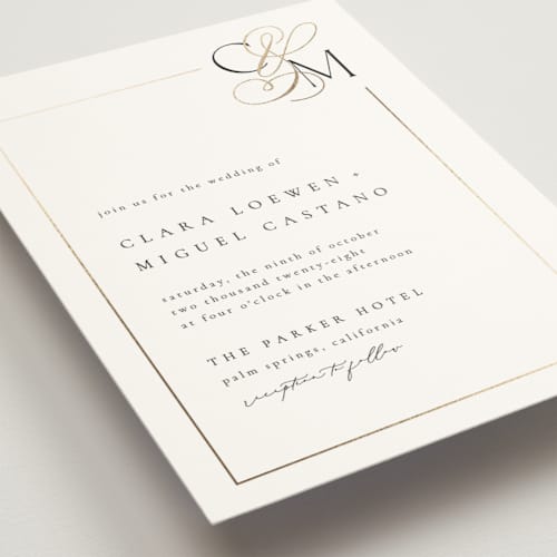 This is a silk foil stamped wedding invitations with foil pressed by Kelly Schmidt called golden ampersand printing on signature in standard