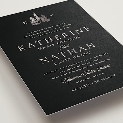 This is a eclipse foil stamped wedding invitations with foil pressed by Stacy Maalouf called gilded forest printing on signature in standard