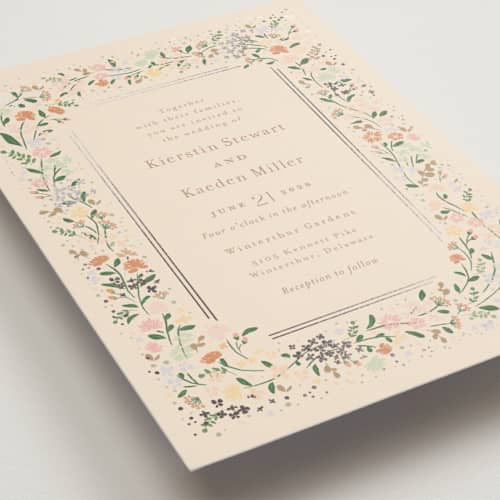 This is a ivory foil stamped wedding invitations with foil pressed by Jennifer Wick called esther's garden printing on signature in standard