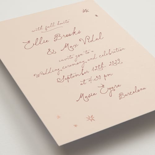 This is a terracotta sunset foil stamped wedding invitations with foil pressed by Ani Somi called written in the stars printing on signature in standard