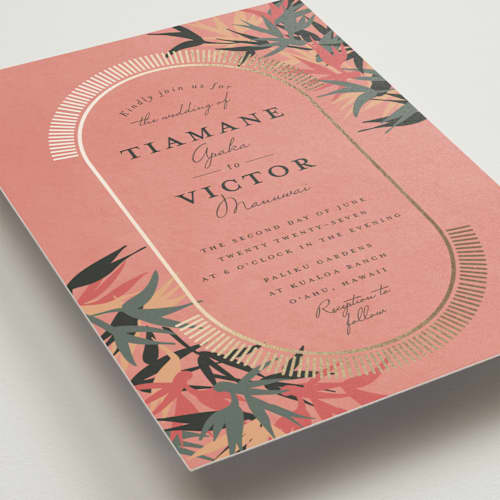 This is a coral foil stamped wedding invitations with foil pressed by Julie Hebert called birds of paradise printing on signature in standard