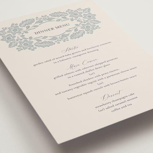 This is a dusty blue menu cards with standard by Jen Owens called embroidered printing on signature in standard