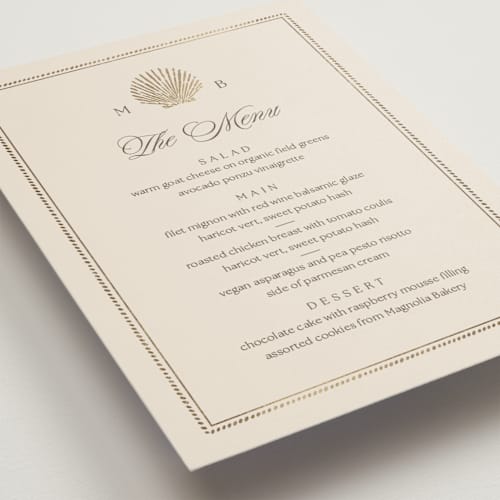 This is a champagne menu cards with foil pressed by Griffinbell Paper Co. called seaside printing on signature in 5x7