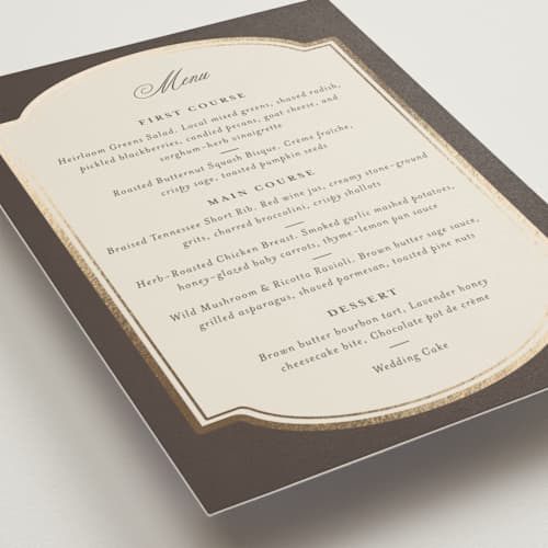 This is a cognac menu cards with foil pressed by Emily Betts called arch frame printing on signature in 5x7