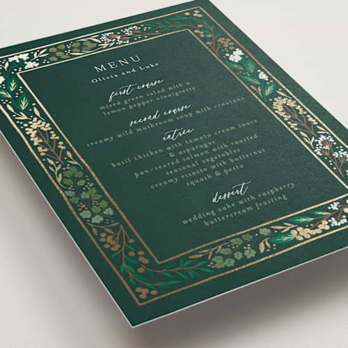 This is a evergreen menu cards with foil pressed by Alethea and Ruth called illuminated storybook printing on signature in 5x7