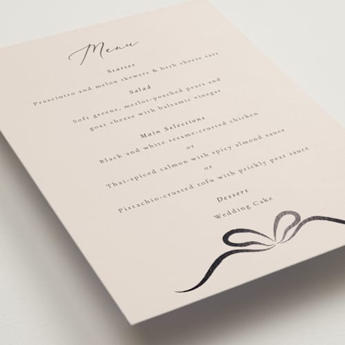 This is a tuxedo menu cards with foil pressed by Corinne Malesic called bow printing on signature in standard