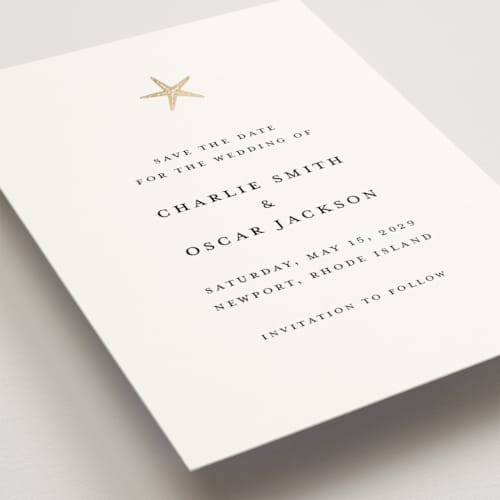 This is a pearl foil stamped save the date cards with foil pressed by Pippa Shaw called lobster printing on signature in standard