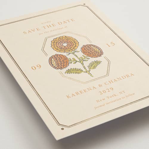 This is a ochre foil stamped save the date cards with foil pressed by Hannah Bowman called marigold printing on signature in standard