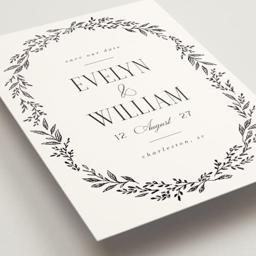 This is a snow foil stamped save the date cards with foil pressed by Laura Hankins called wildflora printing on signature in standard