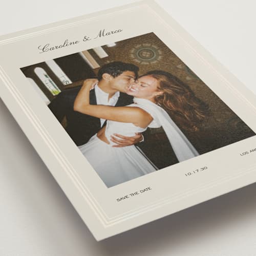 This is a shell save the date with foil pressed by Kelly Watkins called glossy frame printing on signature in standard