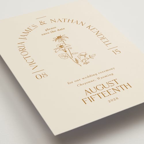 This is a cream save the date with standard by Baumbirdy called floral type arch printing on signature in standard