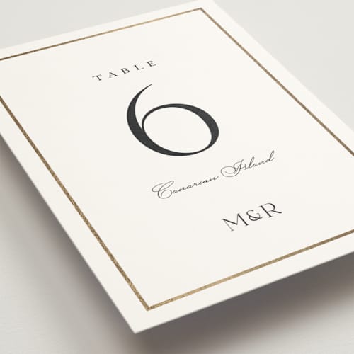 This is a moonstone table numbers with foil pressed by Lucrecia Caporale called timeless charm printing on doublethick in standard