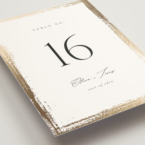 This is a silk table numbers with foil pressed by Kelly Schmidt called brushed edge printing on doublethick in standard