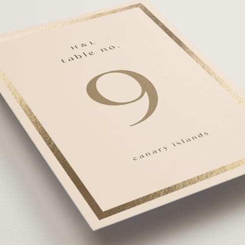 This is a latte table numbers with foil pressed by Stacy Maalouf called framed photo printing on doublethick in standard