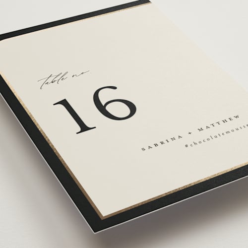 This is a black tie table numbers with foil pressed by Carolyn Nicks called tuxedo printing on doublethick in standard